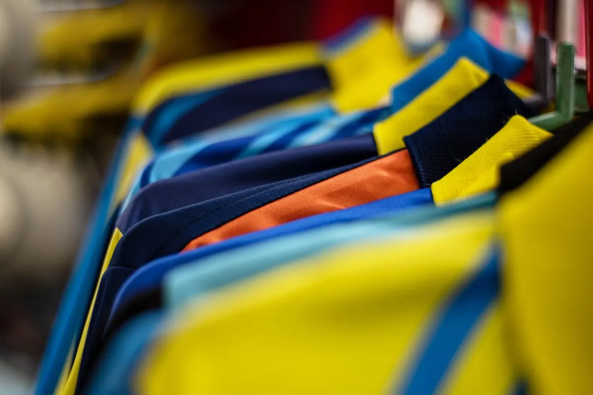 Football sports jersey are hanging in a public store